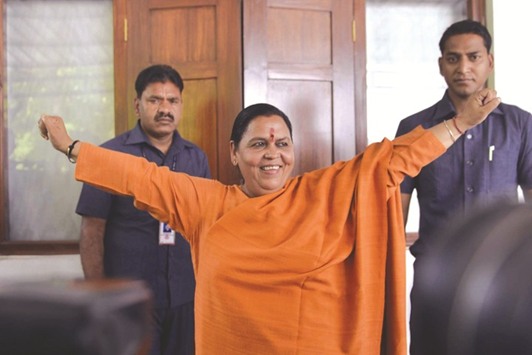 Water Resources Minister Uma Bharti gestures as she addresses a press conference in New Delhi yesterday.