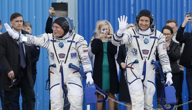 NASA astronaut Jack David Fischer (R) and Russian cosmonaut Fyodor Yurchikhin