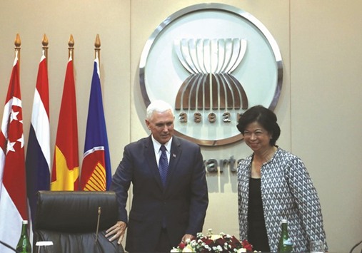 US Vice President Mike Pence with Philippinesu2019 Permanent Representative to Asean Elizabeth Buensuceso at the Asean Secretariat in Jakarta.