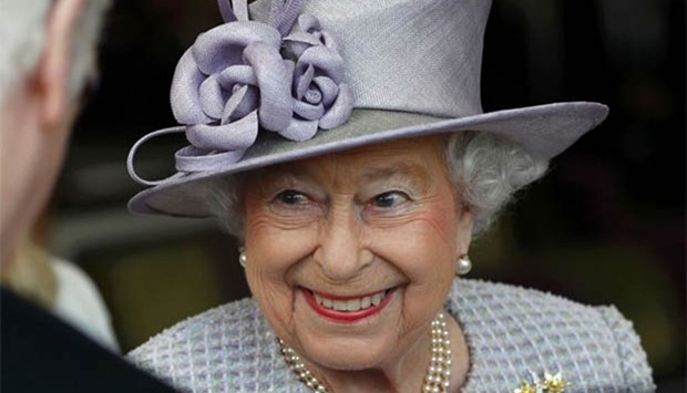 Queen Elizabeth reacts as she meets residents during her tour of Priory View earlier this month.