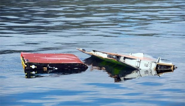 A modified genuine Boeing 777 flaperon is tested in waters near Hobart, capital of Tasmania, to help determine where the final resting place of missing Malaysia Airlines jet MH370 might be.