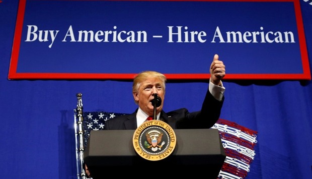 US President Donald Trump speaks before signing an executive order directing federal agencies to recommend changes to a temporary visa program used to bring foreign workers to the United States to fill high-skilled jobs during a visit to the world headquarters of Snap-On Inc, a tool manufacturer, in Kenosha, Wisconsin, US.