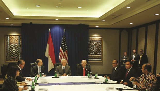 US Vice President Mike Pence (centre), along with US ambassador to Indonesia Joseph Donovan (right), chairs a discussion with business leaders in Jakarta yesterday. Pence announced $10bn in deals between American and Indonesian companies during his visit to Jakarta.