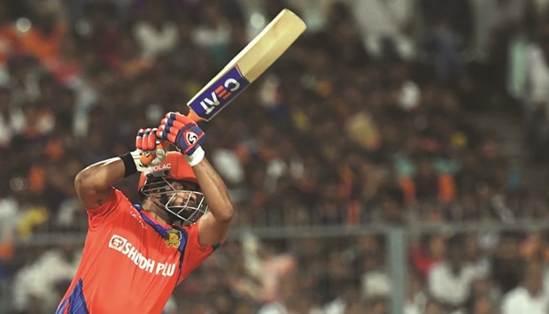 Gujarat Lions captain Suresh Raina plays a shot against Kolkata Knight Riders at The Eden Gardens Cricket Stadium in Kolkata yesterday.