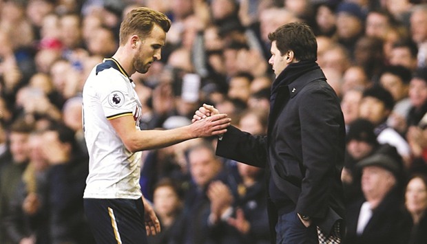 File picture of Tottenhamu2019s Harry Kane shaking hands with manager Mauricio Pochettino during an English Premier League match.  Europe  QATAR  TEST  TT  rain  fire  London  US  woes  England  1  IT  World Cup  Wenger  Court  Italy  IS  King  dog  campaign  CID  Sur  opposition  sea  war  Shock  future  lit  crash  bee  QU  nationals  EU  GE  European  WHO  winning  t  Manchester United  Goa  world  UN  Leicester  fight  Four  PM  young  Wembley  League Cup  Juventus  leader  aid  art  strength  Audi  tea  seven  Man  training  final  FINA  Manchester City  Premier League  win  team  Rio  FA Cup  Chelsea  race  fans  season  ISI  Five  ALI  ARY  Champions League  Champions  ToT  row  sign  2  Qata  QA  ALF  mental  challenge  injury  TED  competition  ties  huge  book  Why  Arsenal  Arsene Wenger  Europa League  hit  counter  TRAIN  POS  Like  wealth  years  actor  seas  IR  Spotlight  camp  ONA  PoC  Games  ACI  AI  Group A  Mauricio Pochettino  press  ANC  Manchester  game  AST  semi-f
