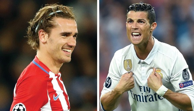 File picture of Atletico Madrid striker Antoine Griezmann (L) and Real Madrid striker Cristiano Ronaldo. Their teams will face each other in the Champions League semi-final.