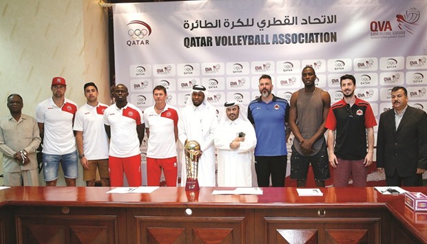    Qatar Volleyball Association officials pose with Al Rayyan and Al Arabi players and officials ahead of todayu2019s Emir Cup final. PICTURE: Jayaram