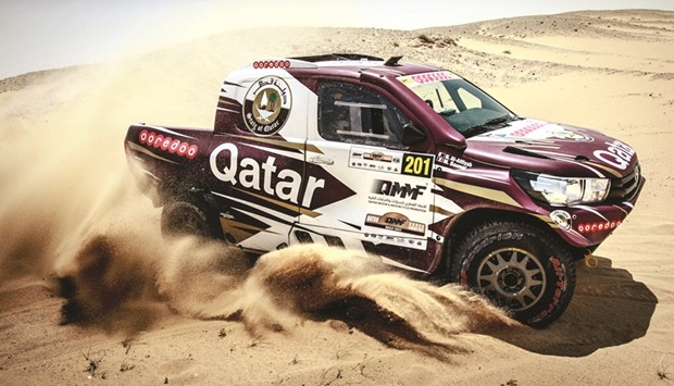 Qataru2019s Nasser Saleh al-Attiyah at home in the sand at the Qatar Cross-Country Rally.