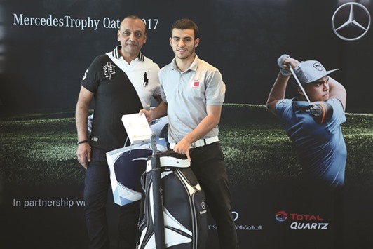 Qatar national player Sager al-Naimi (right) won in the menu2019s category A scoring 43 points.