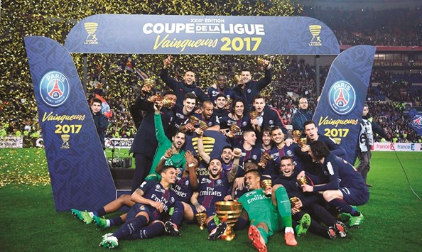 Paris Saint-Germainu2019s players celebrate after winning the French League Cup in Decines-Charpieu, near Lyon, France on Saturday night. (AFP)