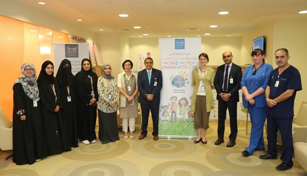 Sidra clinicians and health promoters during Autism Awareness Day.