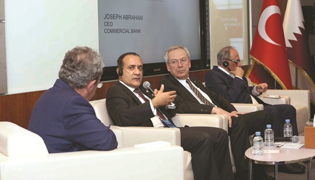 Commercial Bank CEO Joseph Abraham stresses a point during the panel discussion.