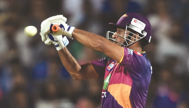 Rising Pune Supergiant player Mahendra Singh Dhoni plays a shot against Sunrisers Hyderabad at The Maharashtra Cricket Association Stadium in Pune yesterday.