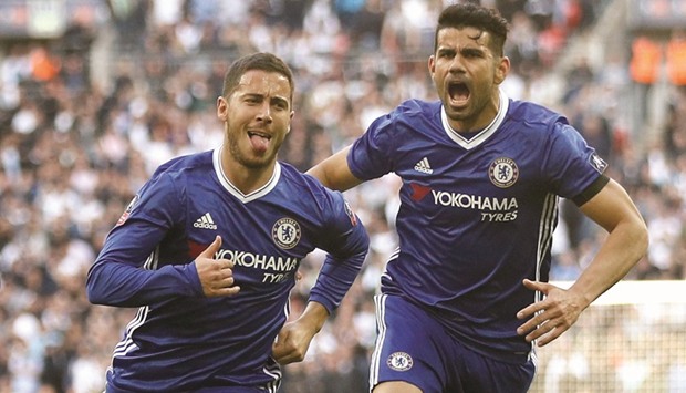 Chelseau2019s Eden Hazard celebrates scoring their third goal with Diego Costa during the FA Cup semi-final between Tottenham Hotspur and Chelsea at the Wembley Stadium.