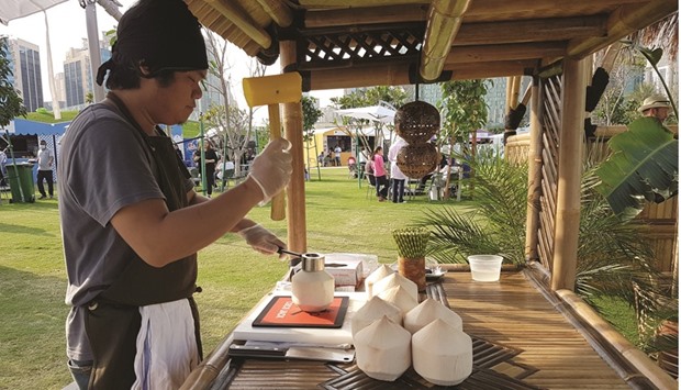 Tender coconuts are among the organic offerings at QIFFu2019s Health Zone. PICTURE: Joey Aguilar