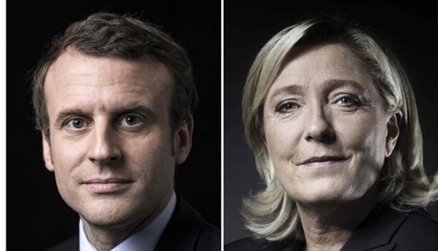 French presidential candidates Emmanuel Macron and Marine Le Pen are pictured in Paris.