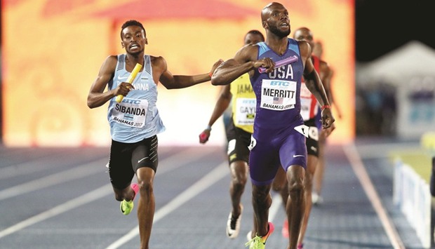 LaShawn Merritt of the USA and Karabo Sibanda of Botswana run to the finishline in the menu2019s 4x400m relay final at the IAAF World Relays in Nassau, Bahamas, on Sunday. (AFP)