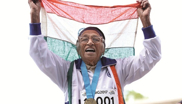 101-year-old Man Kaur of India celebrates after competing in the 100m sprint in the 100+ age category at the World Masters Games at Trusts Arena in Auckland yesterday. (AFP)