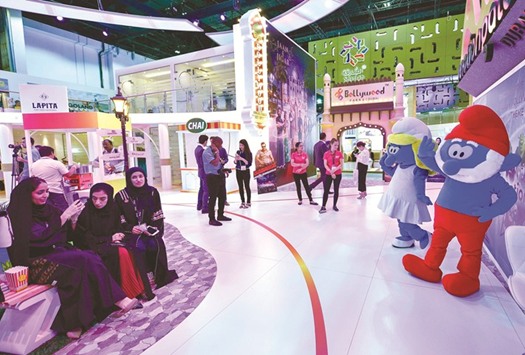 People visit the Dubai Parks and Resorts pavilion during the Arabian Travel Market 2017 (ATM) at the Dubai World Trade Centre yesterday.