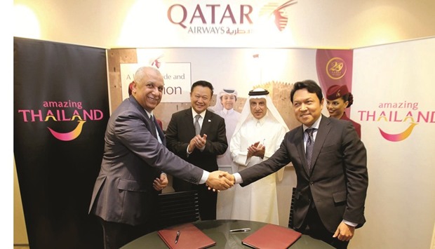 Qatar Airways and Tourism Authority of Thailand officials at the signing of an MoU.
