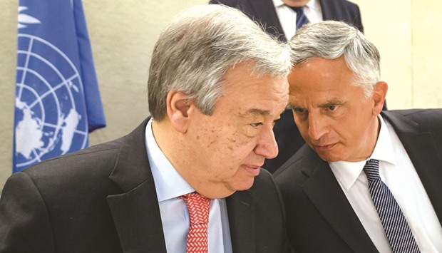 UN Secretary-General Antonio Guterres listens to Swiss Foreign Minister Didier Burkhalter (right) at the opening of a high-level conference to raise funds for war-ravaged Yemen yesterday at the United Nations Office in Geneva.