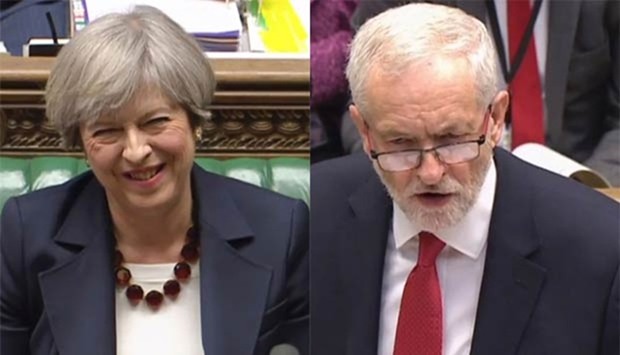 British Prime Minister Theresa May and opposition leader Jeremy Corbyn are pictured in the House of Commons on Wednesday.