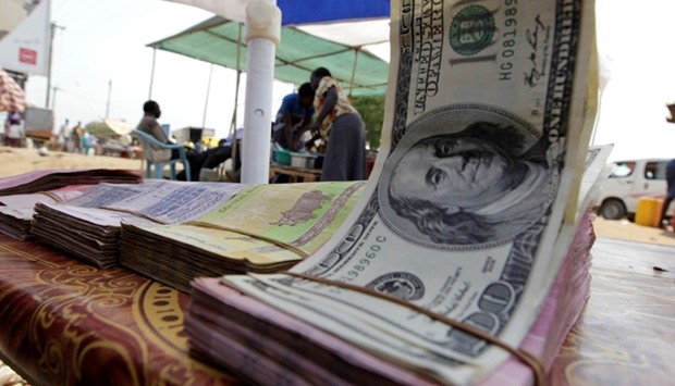 Banknotes are displayed on a roadside currency exchange stall along a street in Juba, South Sudan.  January 14, 2011 file photo.