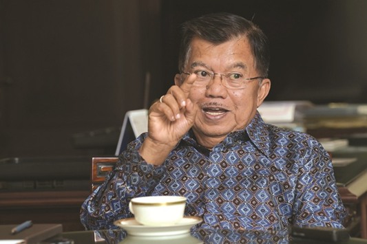 Indonesian Vice President Jusuf Kalla gestures during an interview with AFP at his office in Jakarta.