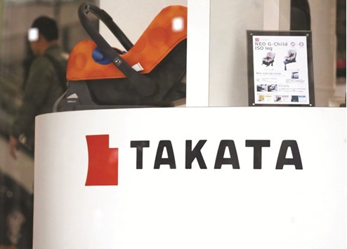 The logo of Takata Corp is seen at a showroom for vehicles in Tokyo. Shares in the company fell 19.53% to u00a5412 ($3.70) after the Tokyo Stock Exchange lifted a trading suspension in the afternoon.