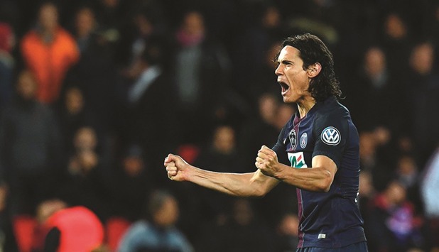 Paris Saint-Germainu2019s Uruguayan forward Edinson Cavani celebrates his goal during the French Cup semi-final match between Paris Saint-Germain and Monaco.