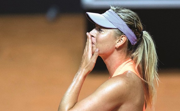 Russiau2019s Maria Sharapova reacts after she defeated Russiau2019s Ekaterina Makarova in their second round match at the WTA Tennis Grand Prix in Stuttgart yesterday.