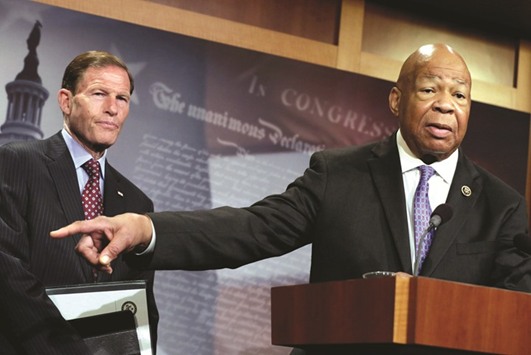 Cummings speaks about former national security adviser Michael Flynn during a news conference yesterday on President Trumpu2019s first 100 days on Capitol Hill in Washington.