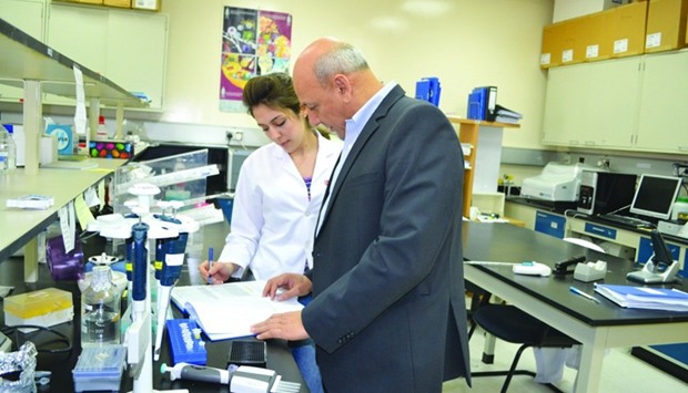 Dr Omar M Ali El-Agnaf in his lab