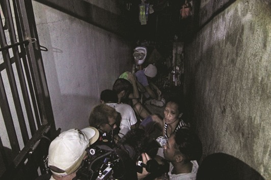 Photo shows people allegedly kept inside a hidden room at the Drug Enforcement Unit of the Manila Police Departmentu2019s Police Station 1 in the Tondo area of Manila.