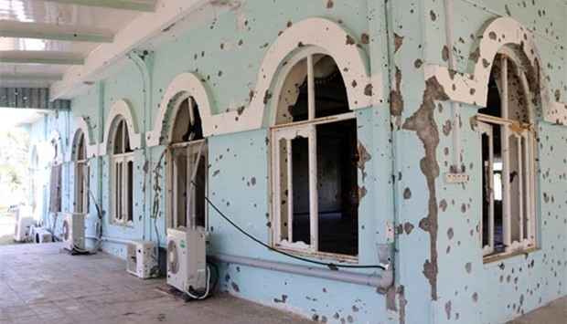 Bullet holes are seen on the wall of a mosque at the military headquarters where the Taliban attack occurred last week in Mazar-i-Sharif.