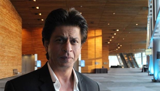 Shah Rukh Khan poses for a photo after giving a talk at a TED Conference in Vancouver on Thursday.