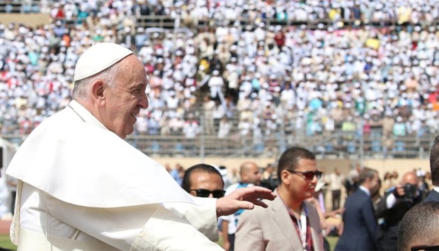 Pope Francis arrives to lead a mass in Cairo