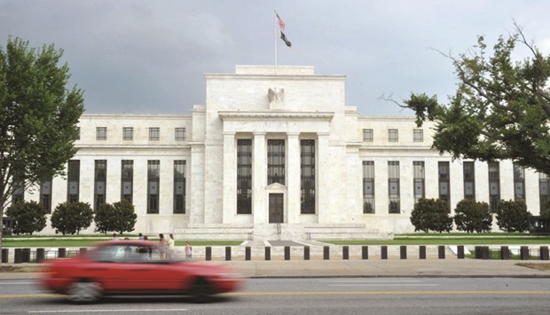 The US Federal Reserve building is seen in Washington, DC. US business investment is finally showing signs of life, and the Federal Reserve may have to reconsider its low-and-slow approach to raising interest rates if such spending becomes a vital force for the economy.
