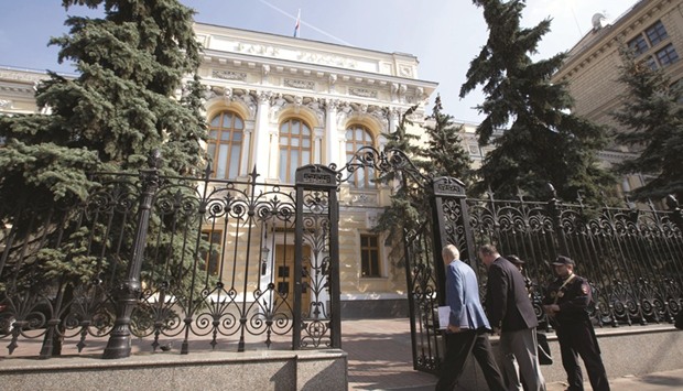 Visitors pass security to enter the headquarters of Russiau2019s central bank in Moscow. So much is riding on the outcome of negotiations between the Organisation of Petroleum Exporting Countries and its partners over their output cuts that the Bank of Russia identified it for the first time as u201cthe key source of inflation risks in the near future.u201d