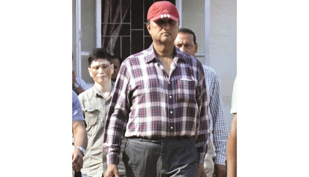 Deputy Superintendent of Police (DSP) Anjan Bora comes out of CID headquarters in Guwahati yesterday.