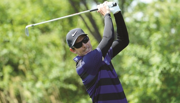 Dylan Frittelli of South Africa plays a shot during the second round of the Volvo China Open golf tournament in Beijing.