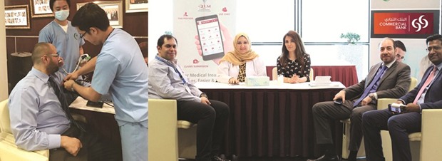 Commercial Bank employees participate in a health screening programme held recently.