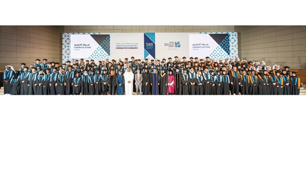 HBKU graduates with HE Sheikha Hind bint Hamad al-Thani, guests and officials.