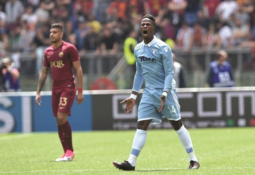 Laziou2019s forward from Senegal Balde Diao Keita celebrates after scoring during the Italian Serie A match between AS Roma vs Lazio at the Olympic Stadium in Rome.