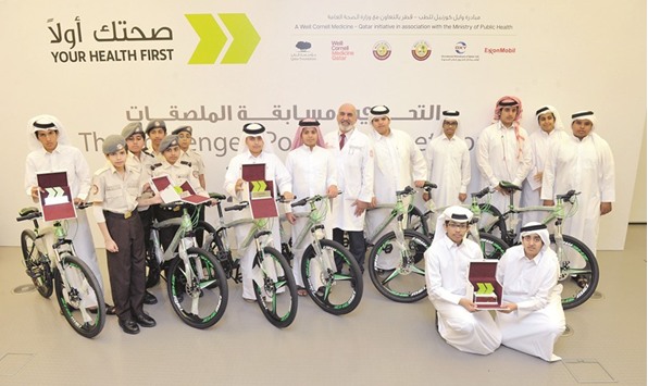 Middle school students won trophies and mountain bikes, presented by WCM-Qu2019s Dr Mohamud Verjee, for creating outstanding posters on the theme of health and wellness.