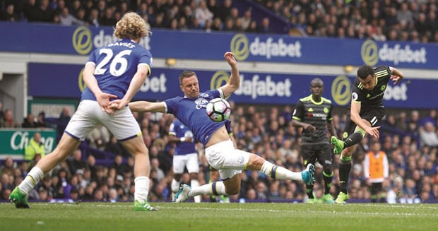 Chelseau2019s Pedro scores his teamu2019s first goal against Everton during their EPL game yesterday.