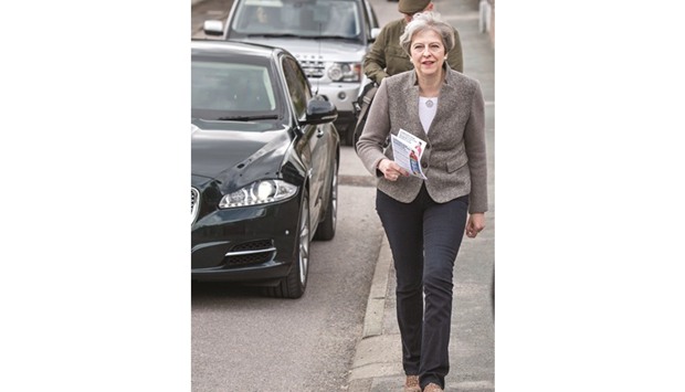 Prime Minister Theresa May goes door-to-door campaigning for Andrew Bowie, Conservative candidate for West Aberdeenshire and Kincardine in the village of Banchory, in Aberdeenshire, north east of Scotland, during a general election campaign visit.