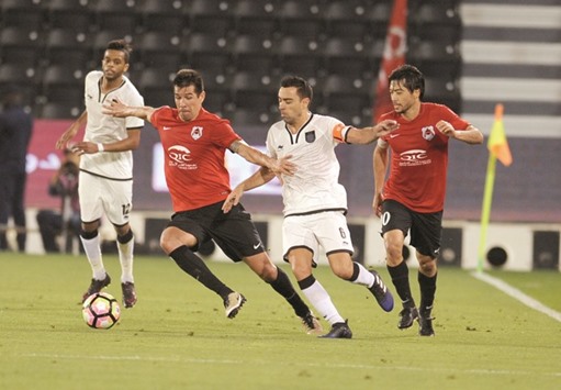 Al Sadd kept the pressure on leaders Lekhwiya with a comprehensive 4-1 win over Al Rayyan.