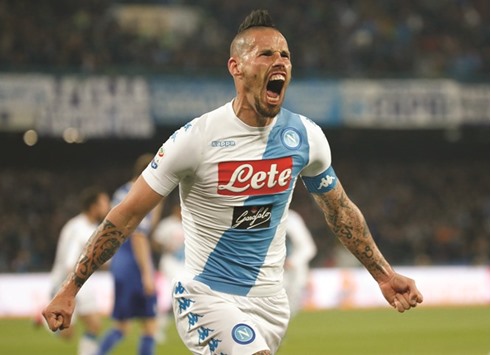 Napoliu2019s Marek Hamsik celebrates after scoring against Juventus. (Reuters)