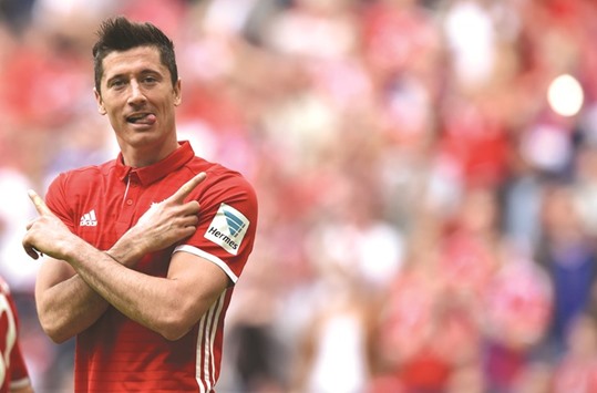 Striker Robert Lewandowski netted his fourth hat-trick for Bayern Munich this season in  Saturday's 6-0 drubbing of Augsburg. (AFP)